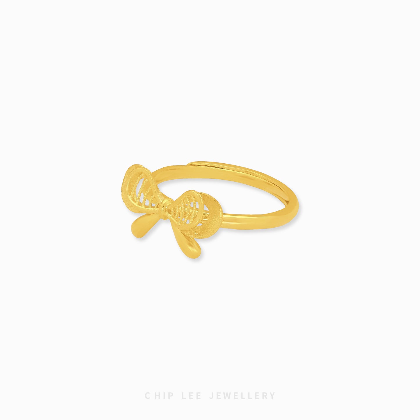 999 Dainty Ribbon Ring by Chip Lee Jewellery, 999 pure gold, featuring a delicate bow design, adding elegance to any outfit.