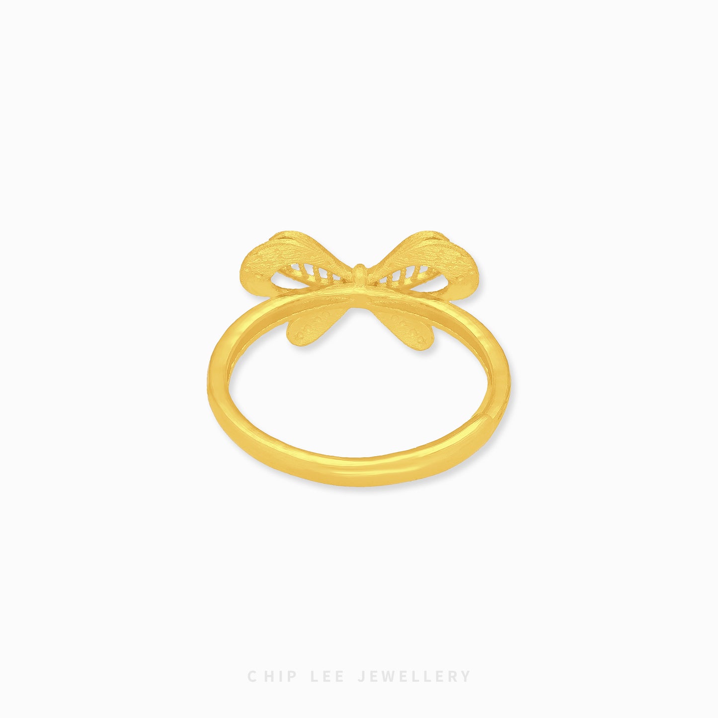 999 Dainty Ribbon Ring by Chip Lee Jewellery, 999 pure gold, featuring a delicate bow design, adding elegance to any outfit.