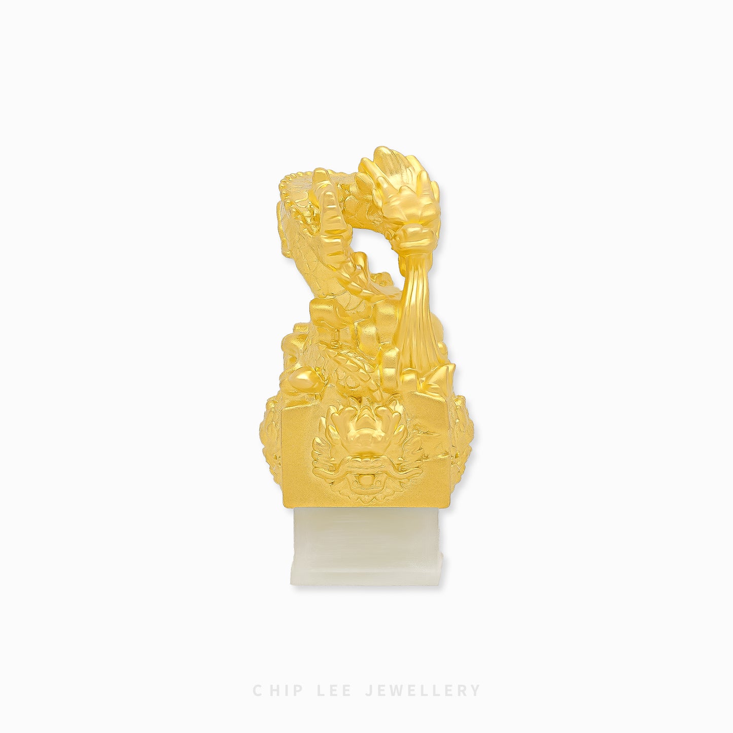 999 pure gold dragon pendant embracing He Tian jade seal, symbolizing power, fortune, protection in a refined traditional jewellery design.