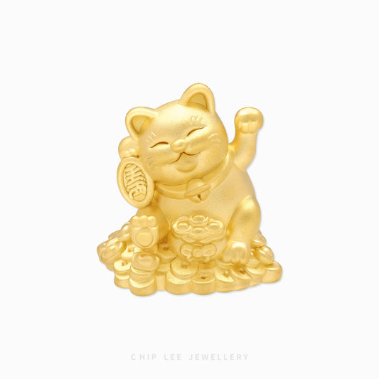999 pure gold Fortune Cat Figurine by Chip Lee Jewellery, symbolising good luck, prosperity and cultural heritage with elegant detailing
