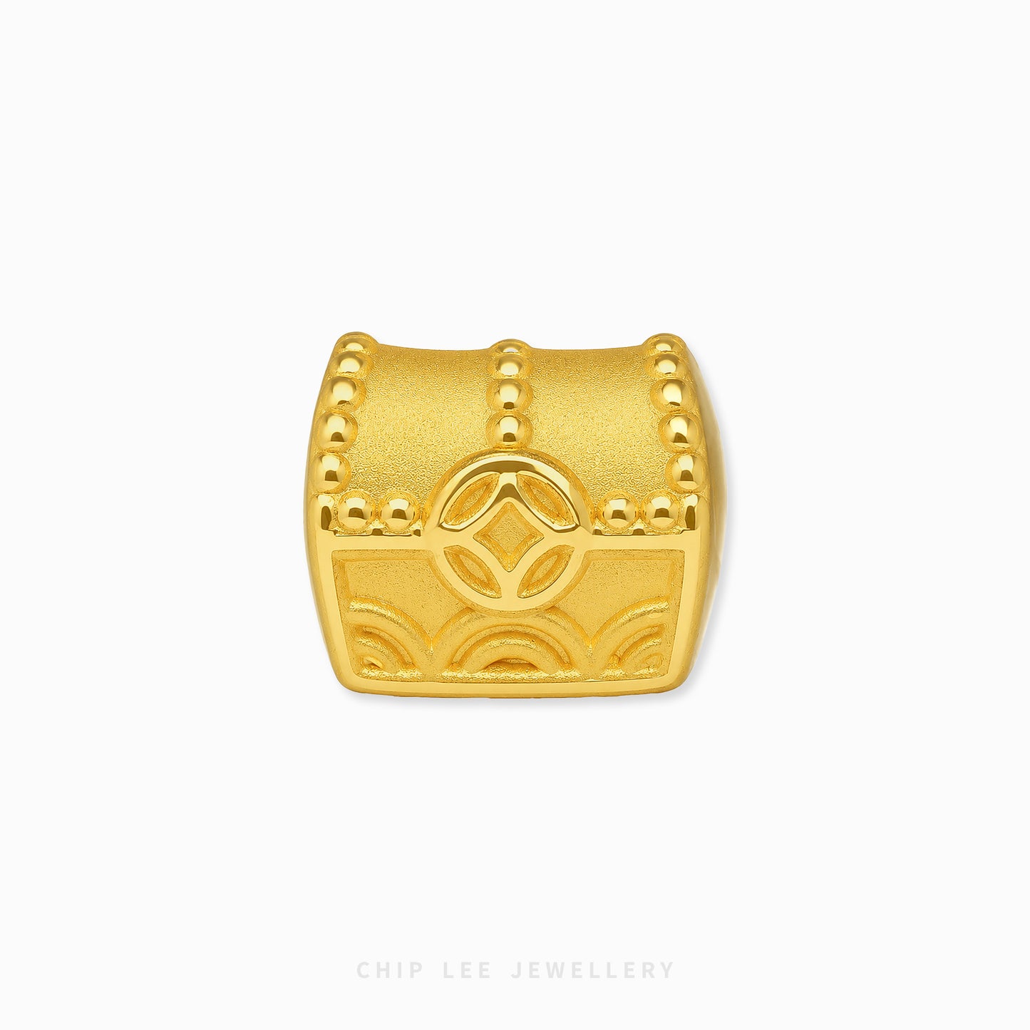 A gold treasure chest charm with embossed details and a central diamond motif, shown on a clean white background with the brand name 'CHIP LEE JEWELLERY' at the bottom.