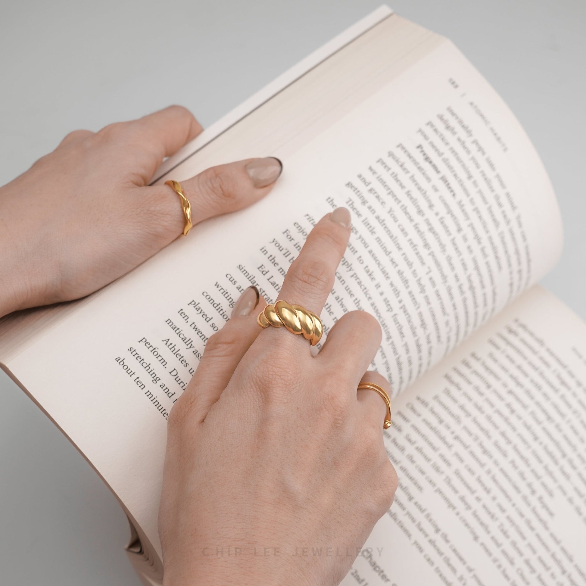 Classic Wave Ring by Chip Lee Jewellery, 916 pure gold, featuring a fluid, undulating design that adds minimalist elegance to any ensemble.