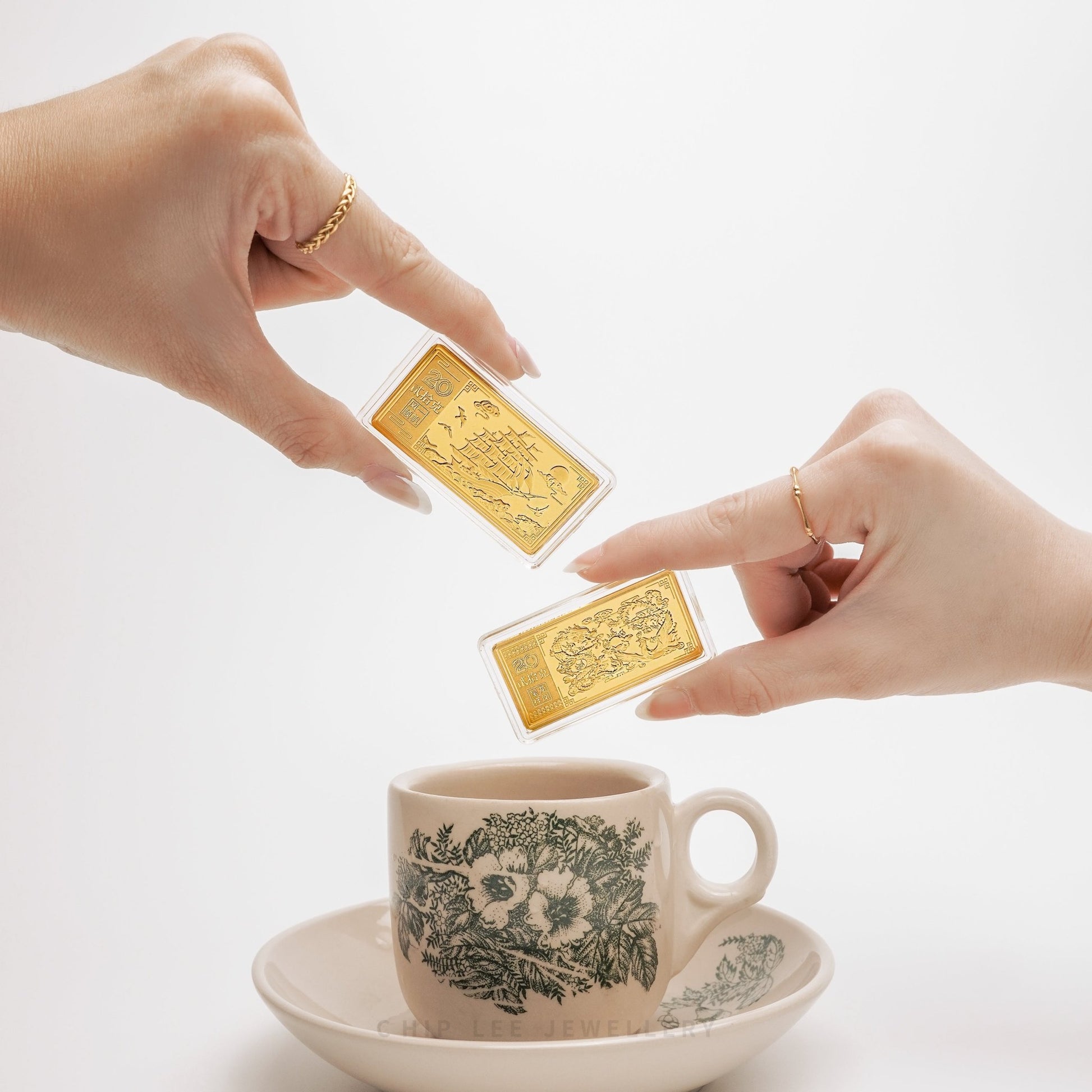 A collection of 999 pure gold bars showcasing various designs, each with distinct symbolic meanings.Hallmarked in Singapore for certified purity and authenticity.