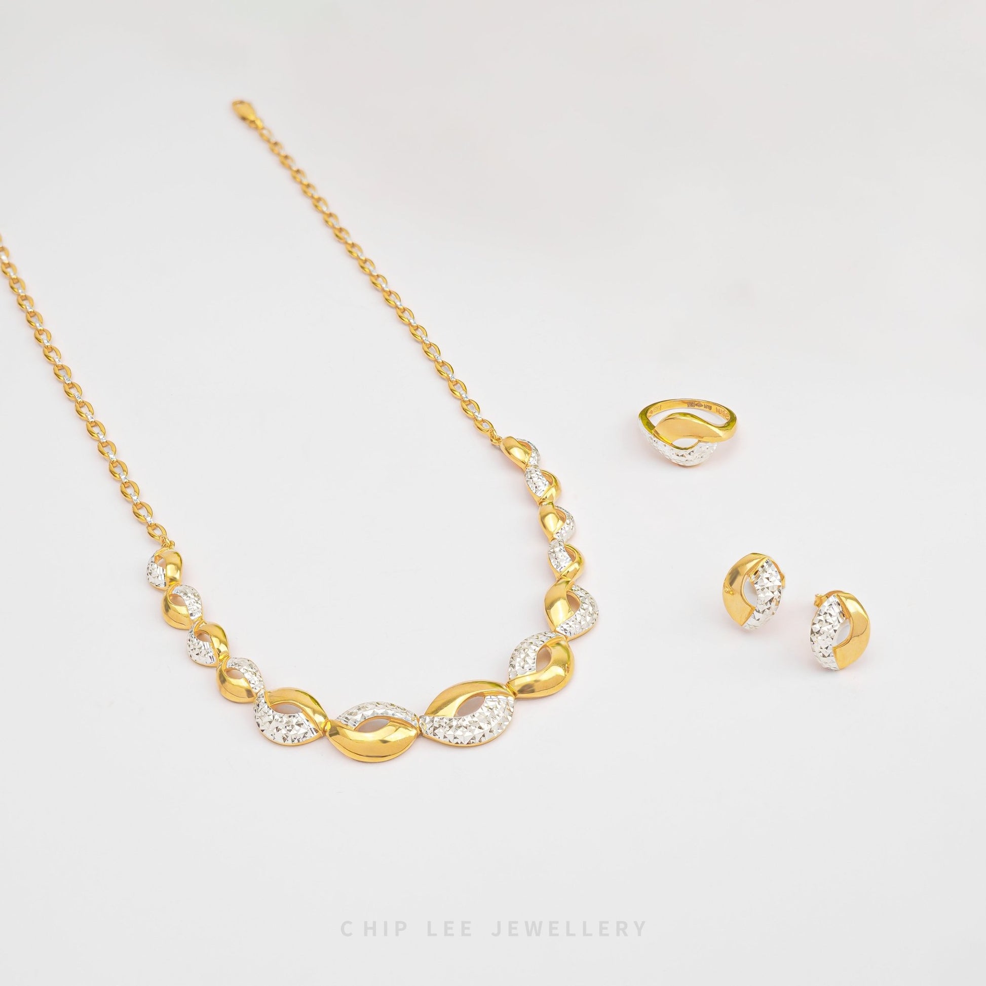 Chip Lee Jewellery Duo Tone Turkey Studs. Bold 916 Pure Gold (22K) earrings with a modern two-tone contrast design. Certified Singapore gold studs.