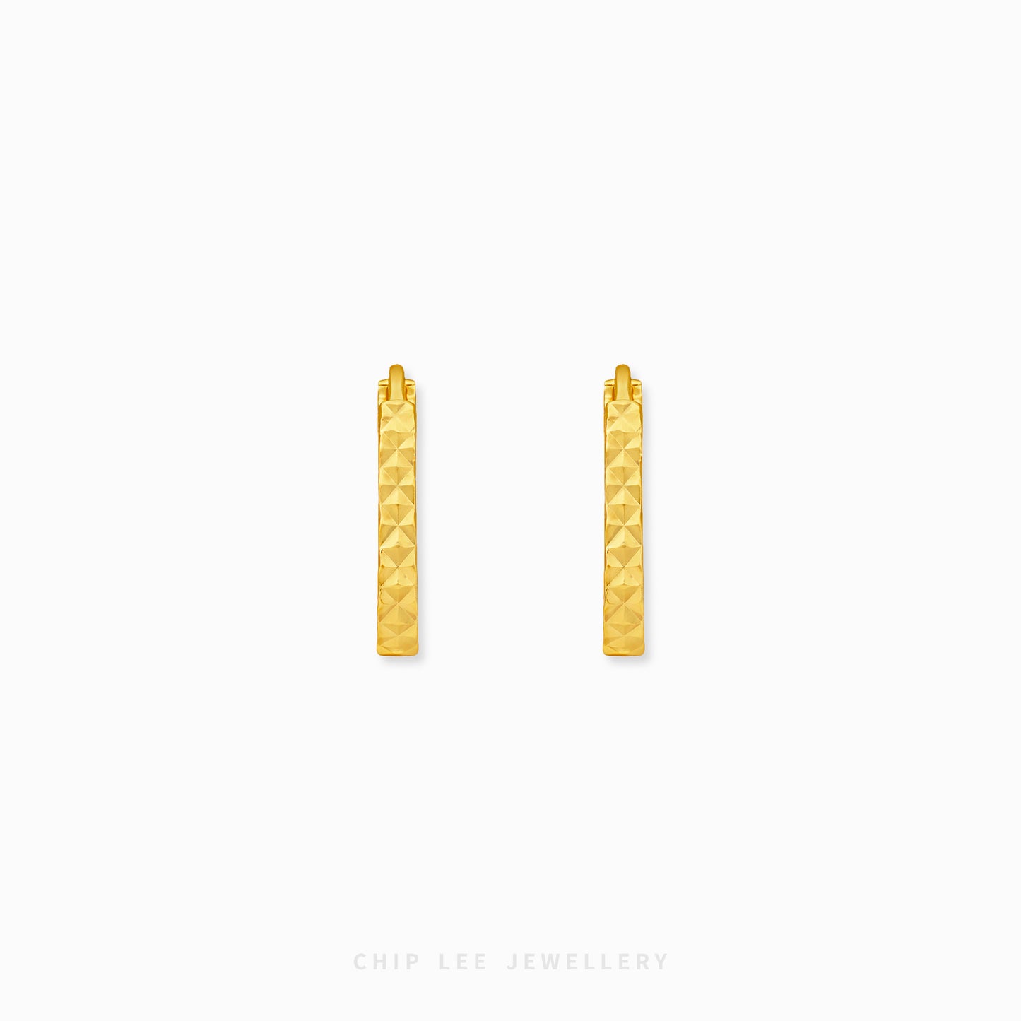 916 gold paperclip hoop earrings with textured design