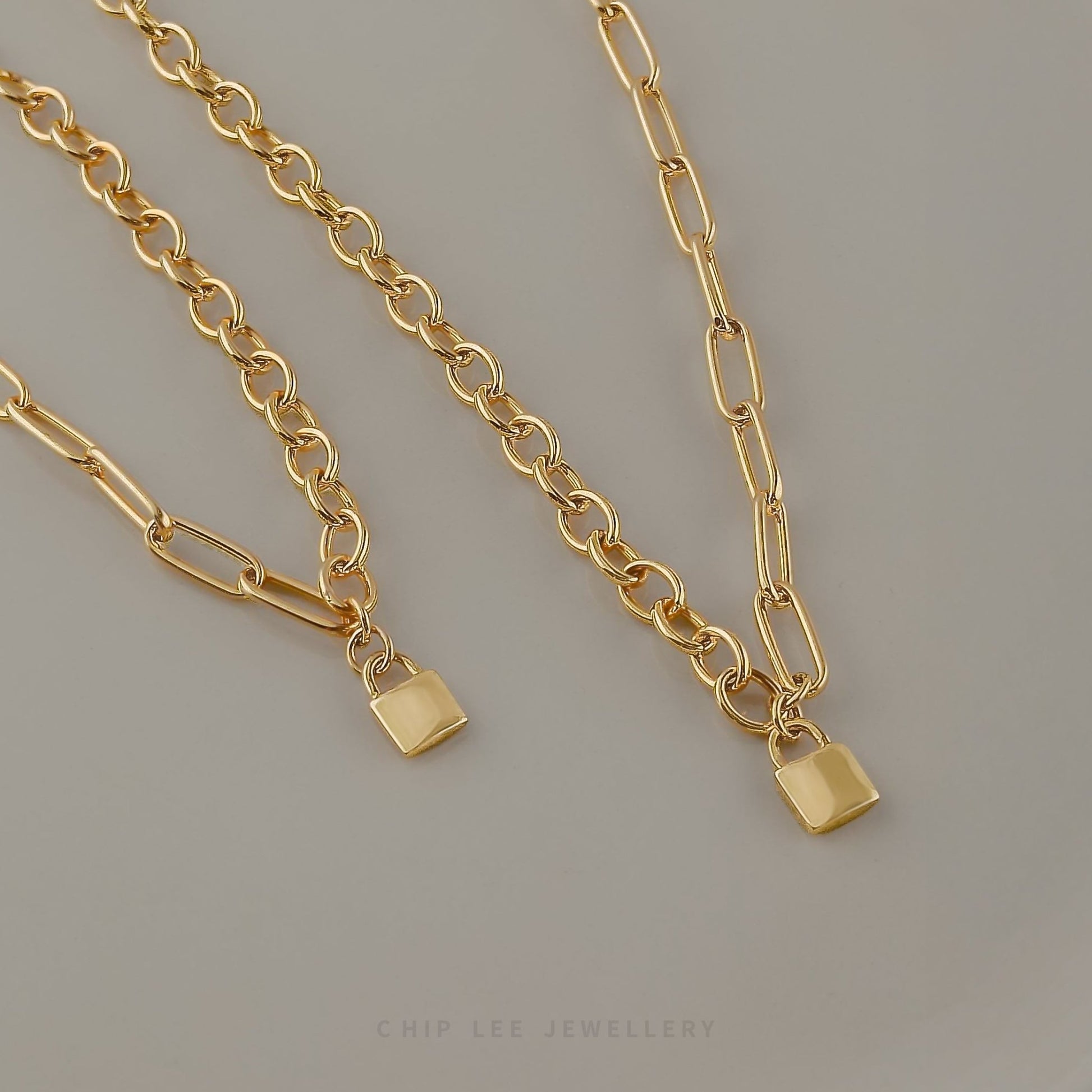 Chip Lee Jewellery Mixed Chain Lock Necklace. Certified 916 Gold (22K) chunky mixed-link chain with a lock pendant. Modern statement jewellery SG.