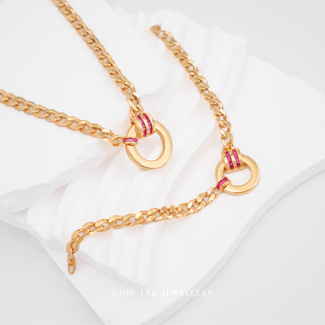 Lightweight and elegant solid 916 gold circular chain necklace with red cubic zirconia design. Hallmarked by Singapore Assay Office for certified purity and authenticity.