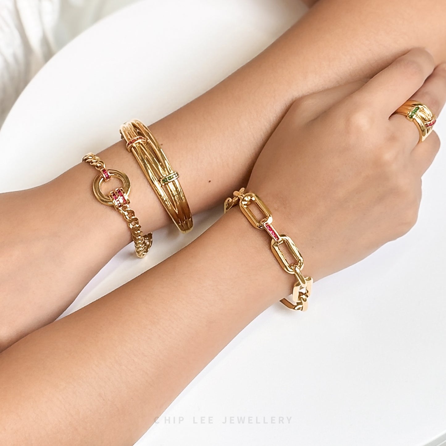 916 gold link bracelet with red cubic zirconia. Hallmarked by Singapore Assay Office for certified purity and authenticity.