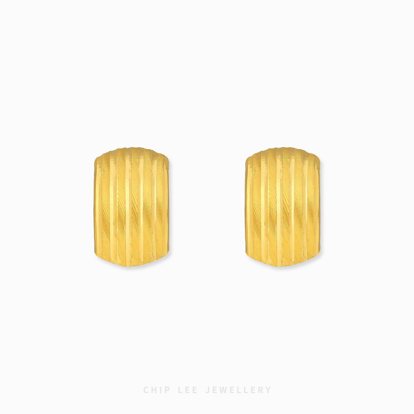 Ribbed hoop earrings with textured ridged detailing and polished gold finish.