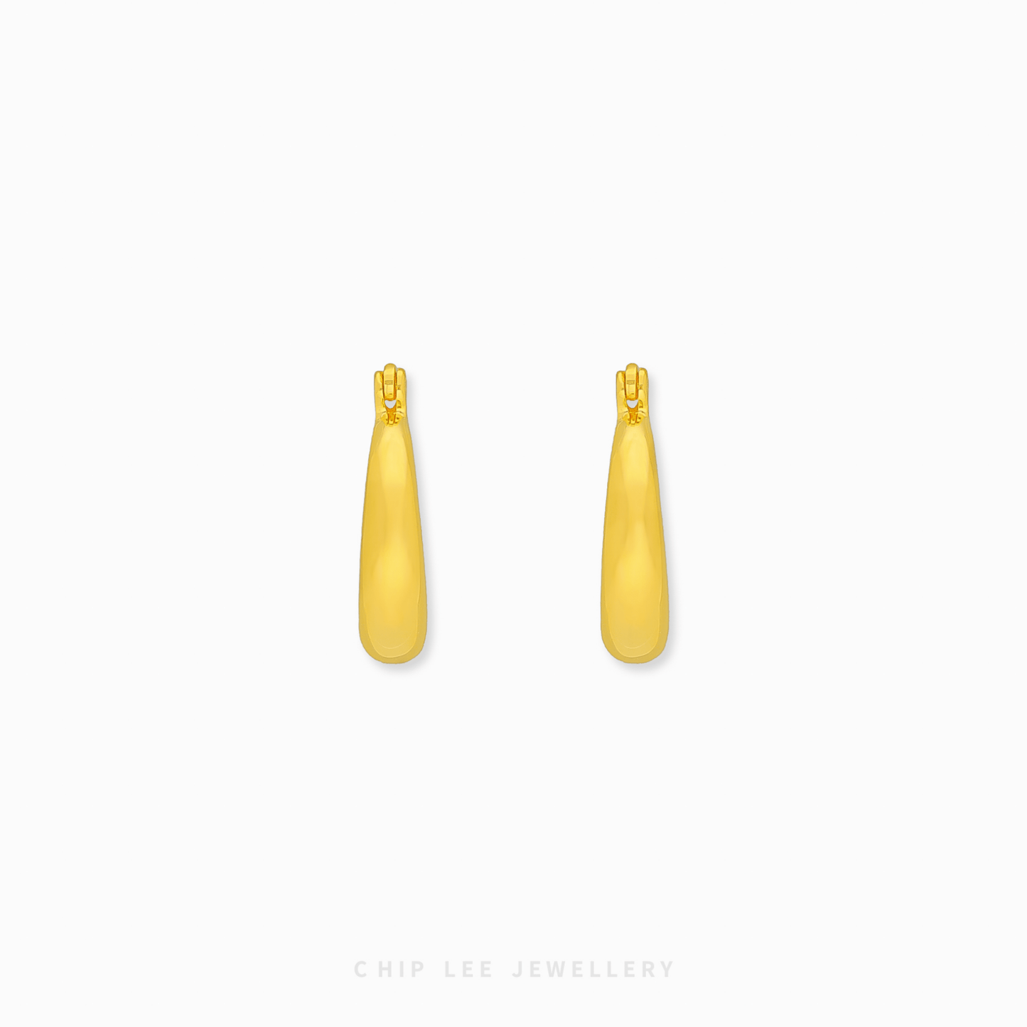 916 Gold Tapered Hoop Earrings by Chip Lee Jewellery Singapore. Sculptural, bold hoops symbolizing strength and unity. Thicker at the bottom.