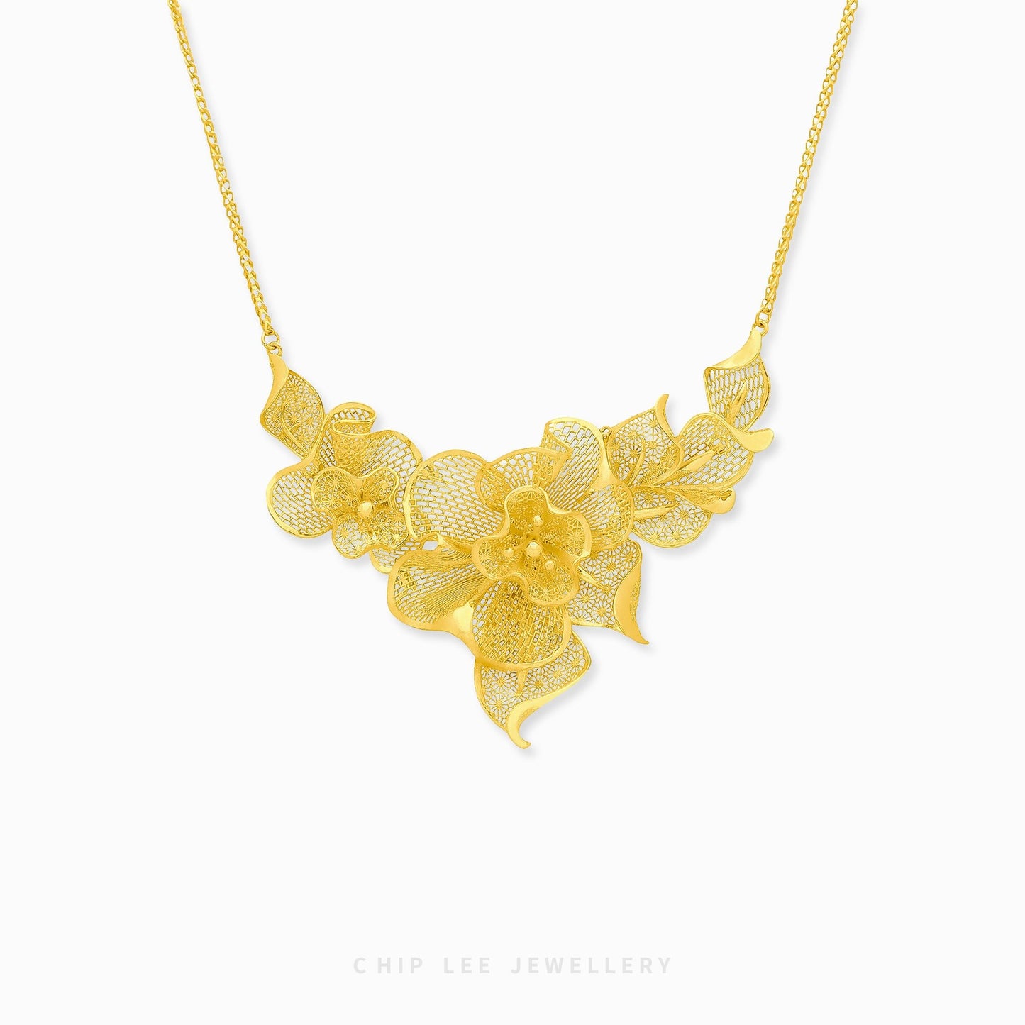 999 24K Gold Flora Necklace featuring delicate floral details in pure gold, designed for timeless elegance and effortless daily sophistication.