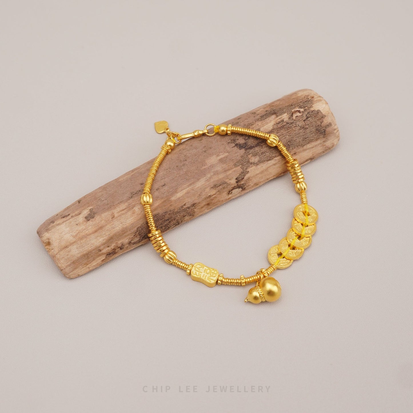 999 Gold Happiness and Prosperity Gu Fa Jin Bracelet with gourd charm and ancient coins symbolising wealth and abundance.