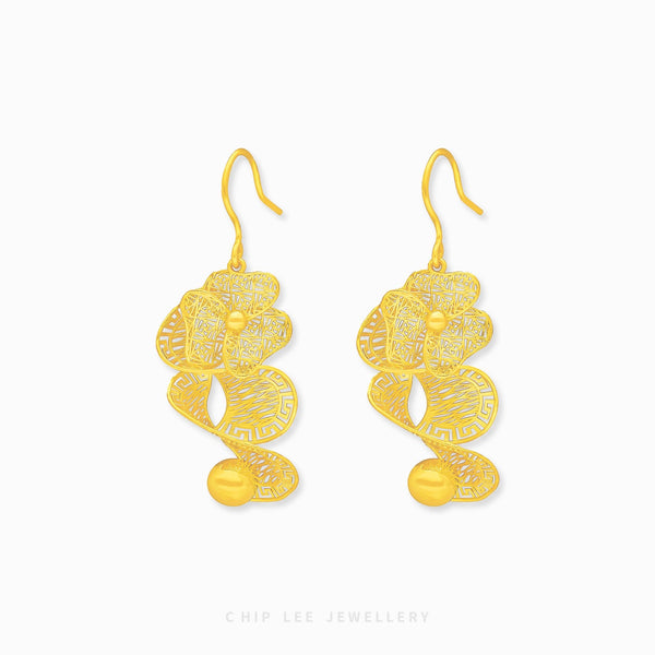 999 Pure Gold Statement Bow Earring featuring a bold yet feminine bow design in solid gold, perfect for standout style and elegant charm.