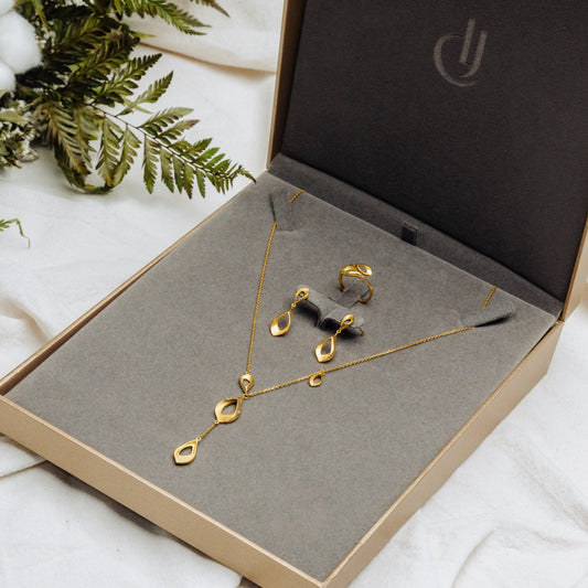 999 | 24K Gold Dewdrop Ringby Chip Lee Jewellery, featuring a delicate teardrop design in pure gold, offering minimalist elegance for any occasion.