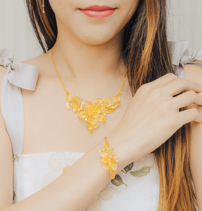 999 24K Gold Flora Bracelet with intricate floral motifs, crafted in pure gold for timeless elegance and everyday refined sophistication.