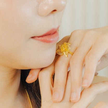 999 24K Gold Flora Ring featuring a delicate flower design in solid gold, perfect for timeless elegance and everyday sophistication.