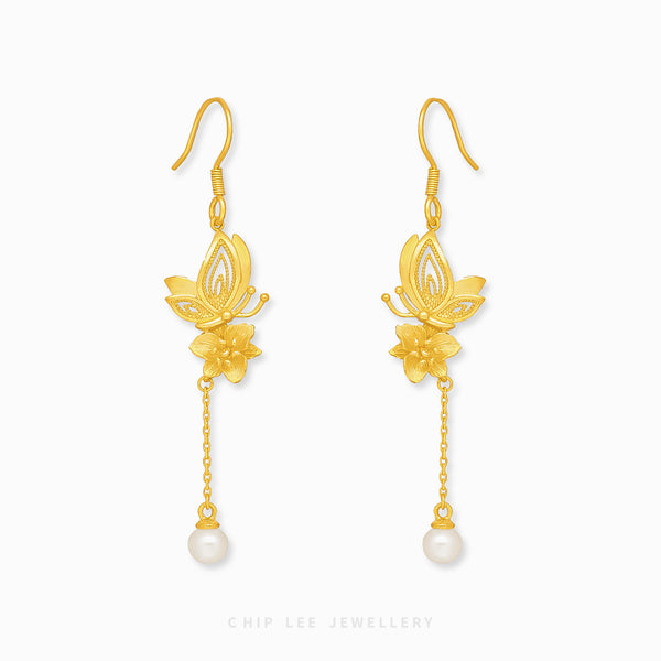 999 Pure Gold Floral Butterfly Pearl Earrings with delicate floral and butterfly designs, accented by pearls, crafted in solid gold for timeless elegance.