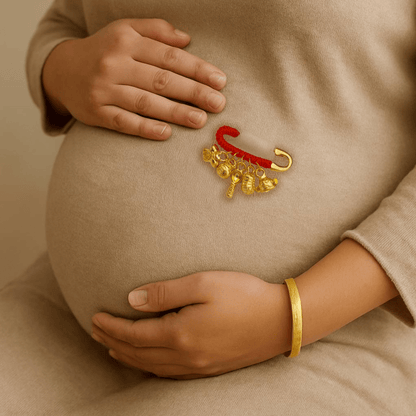 999 Pure Gold Baby Safety Brooch: 24K gold pin with auspicious charms symbolising blessings, safety & prosperity — perfect newborn keepsake.