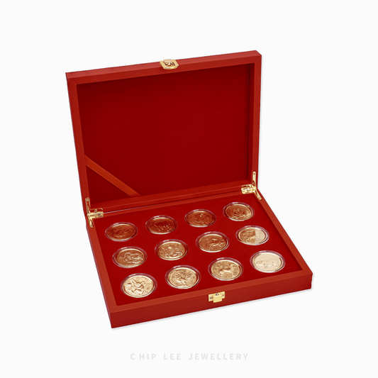 Full collection of 999 Pure Gold 12 Animals Chinese Zodiac Coins in a decorative display case.