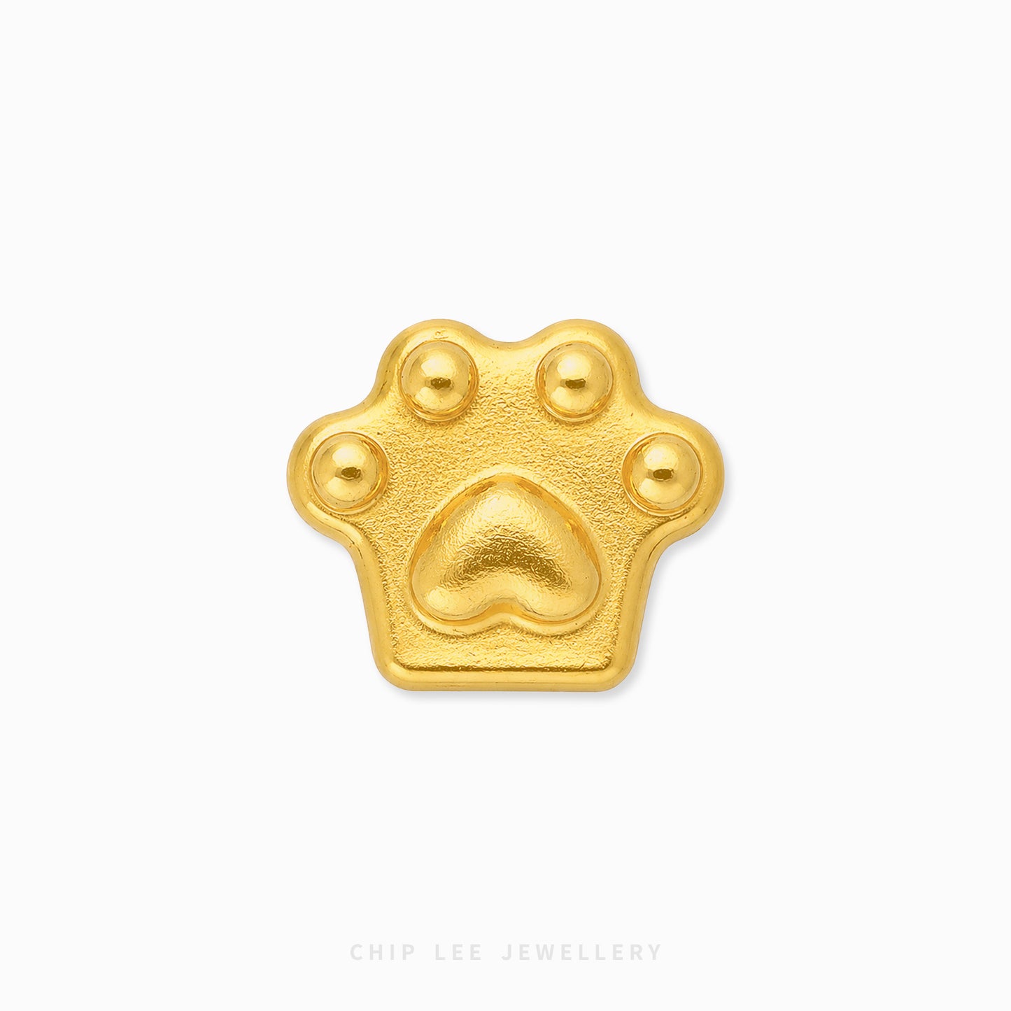 A small gold paw-print charm or pendant with a textured matte finish, centered on a plain white background. The brand name 'CHIP LEE JEWELLERY' is subtly printed in light gray text at the bottom center.