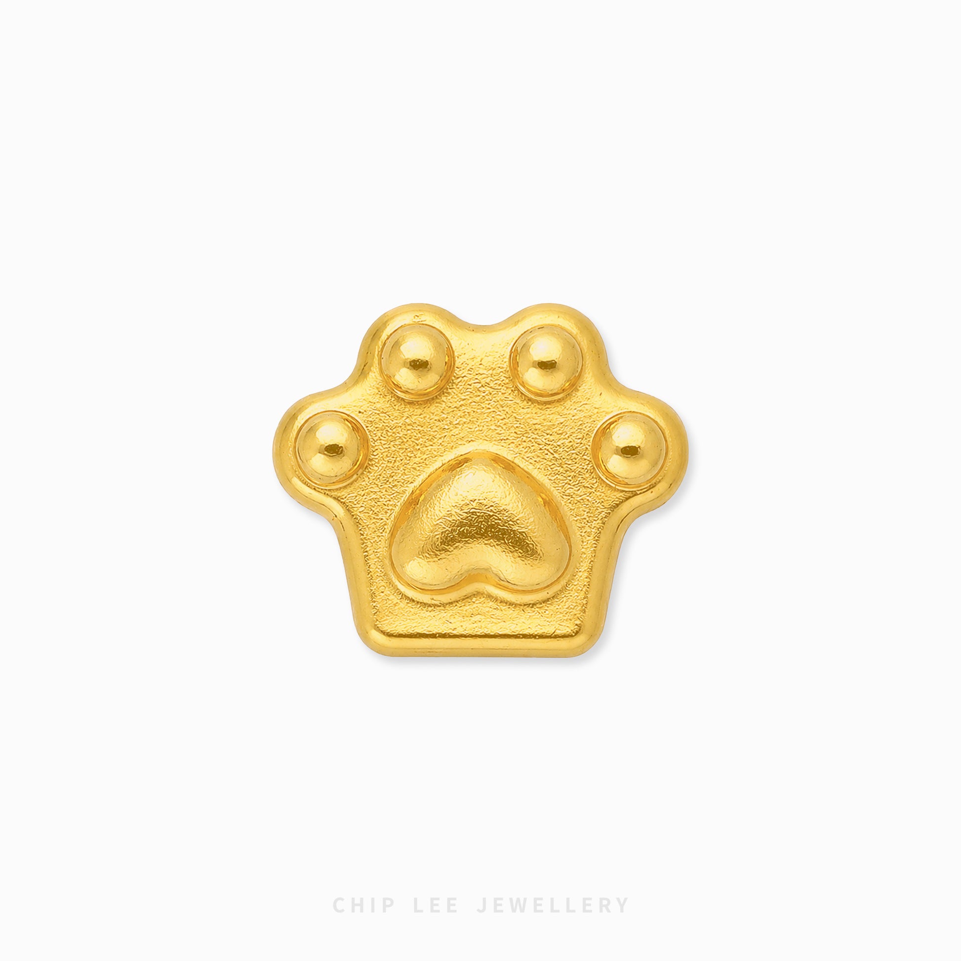 A small gold paw-print charm or pendant with a textured matte finish, centered on a plain white background. The brand name 'CHIP LEE JEWELLERY' is subtly printed in light gray text at the bottom center.