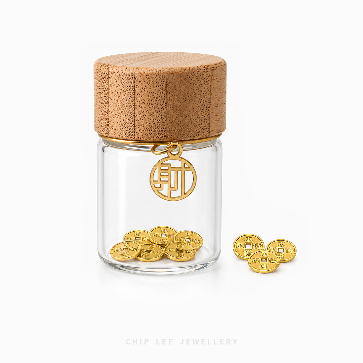 A clear glass jar with a light wood lid and gold-tone hardware, shown on a white background. Several small gold coins are placed inside the jar, with a few more resting beside it.