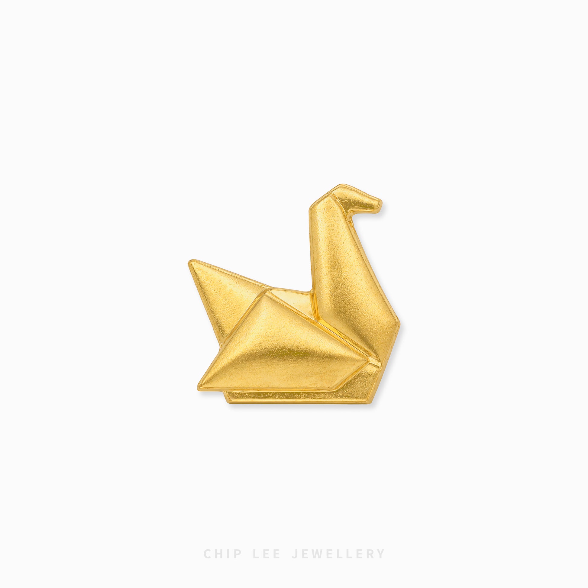 A small gold-toned folded crane pin centered on a plain white background, with the text 'CHIP LEE JEWELLERY' faintly visible at the bottom.
