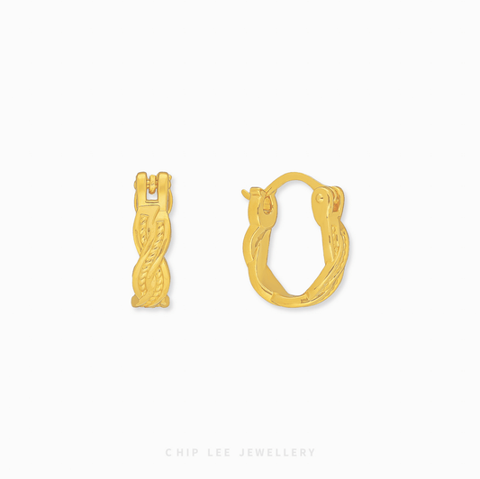 Chip Lee Jewellery Singapore Braided Hoop Earrings 999 Gold for women. Intricate woven design gold hoops. Modern, textured accessory.