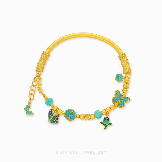 999 Pure Gold Butterfly Gu Fa Jin Bracelet with butterfly motifs, crafted using ancient goldsmithing techniques.