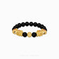 Close-up of 999 Pure Gold Duo Yin Yang Black Agate Pixiu Bracelet with black agate beads and dual Pixiu charms on display.
