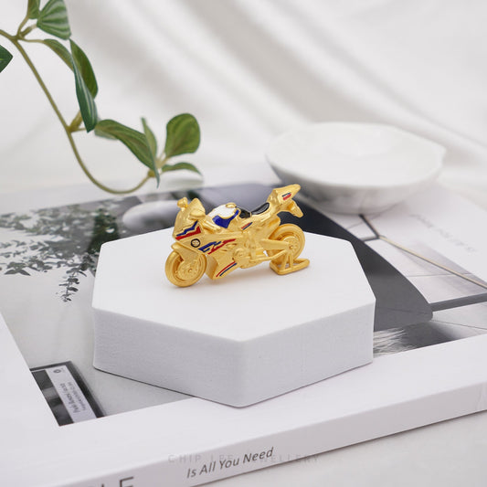 999 Pure Gold Enamel Motorbike Figurine by Chip Lee Jewellery, 24K gold with vibrant enamel detailing, symbolising freedom and luxury