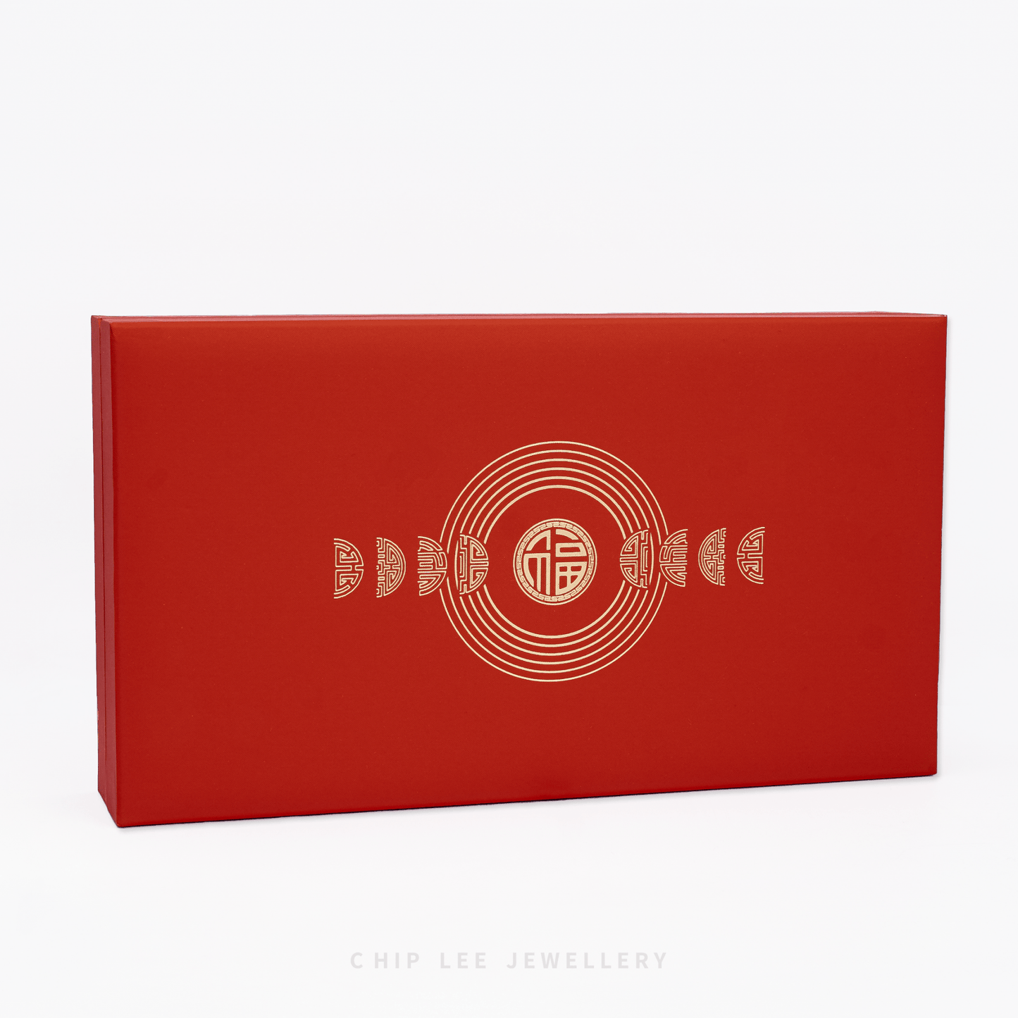 Red jewelry box with gold design and 'Chip Lee Jewellery' branding on a white background
