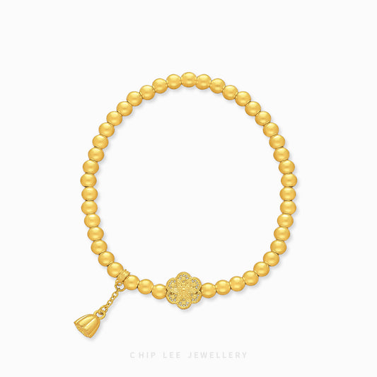 999 Pure Gold Floral Charm Gu Fa Jin Bracelet with intricate floral motifs in a timeless design.