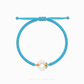 Blue bracelet with a colorful clasp on a white background