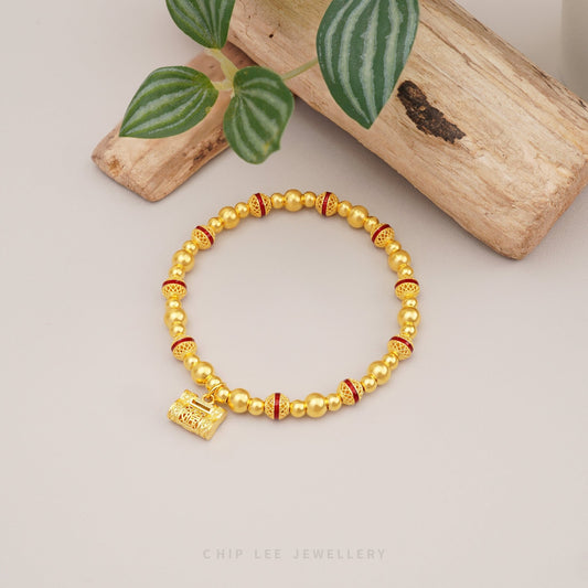 999 Pure Gold Fortune Lock Gu Fa Jin Bracelet with red accents, lock charm symbolising protection, luck, and prosperity.