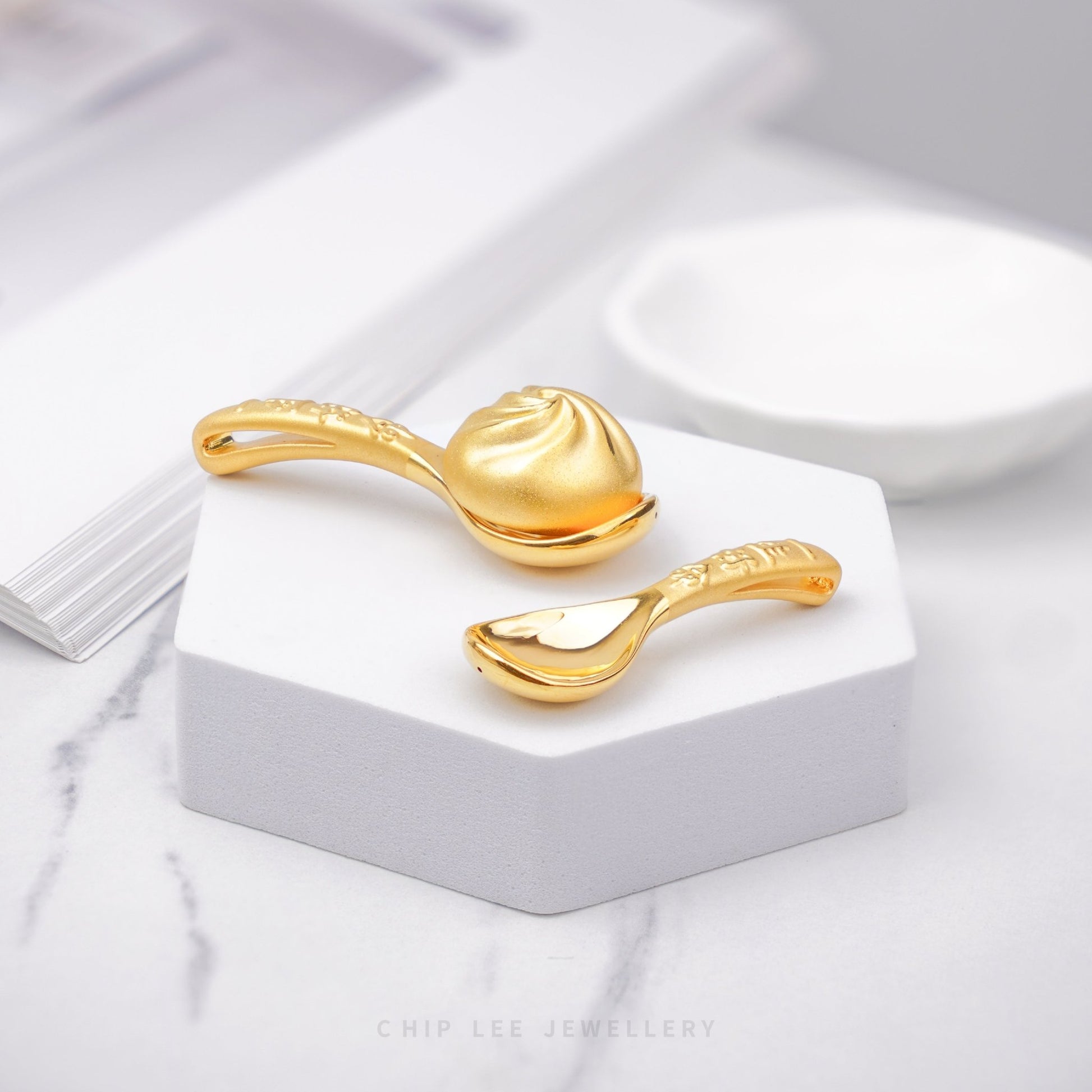 999 Pure Gold Golden Bao Figurine by Chip Lee Jewellery, 24K gold, symbol of wealth and prosperity, intricately designed collectible piece.