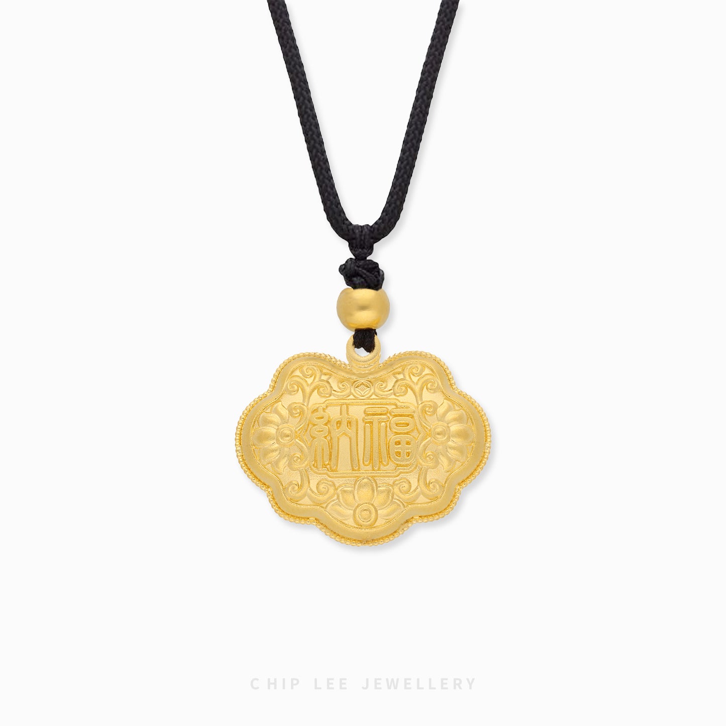 A 999 pure gold necklace with a rope chain and a floral-like patterned pendant, displayed against a white background.