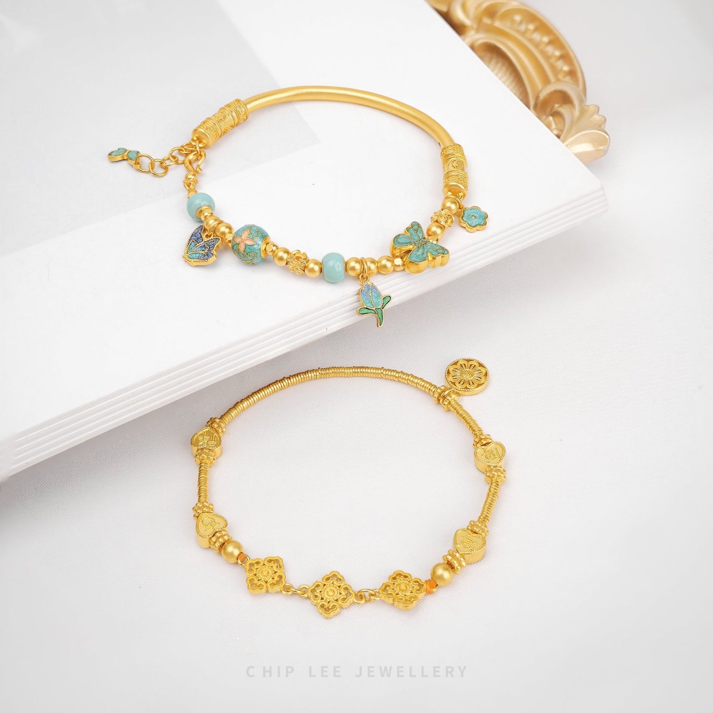 Pure gold bracelets crafted with ancient goldsmithing techniques.