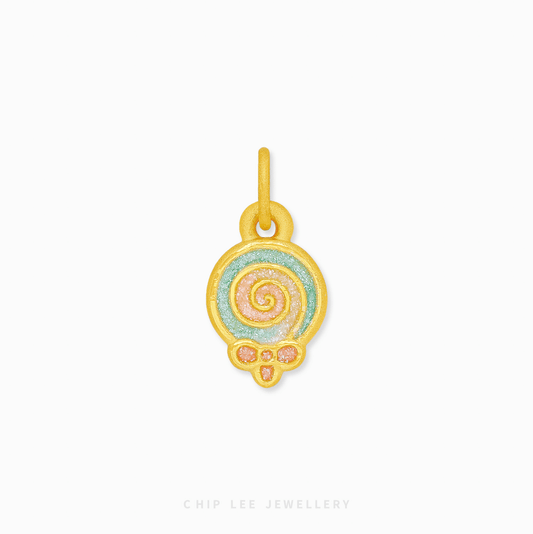 Gold pendant with spiral design on a white background