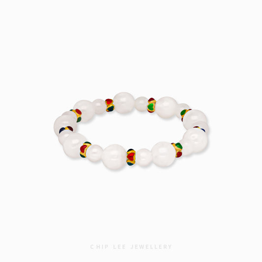 Close-up of 999 Pure Gold Mixed Enamel with White Agate Bracelet featuring gold links, enamel accents, and white agate beads on display.