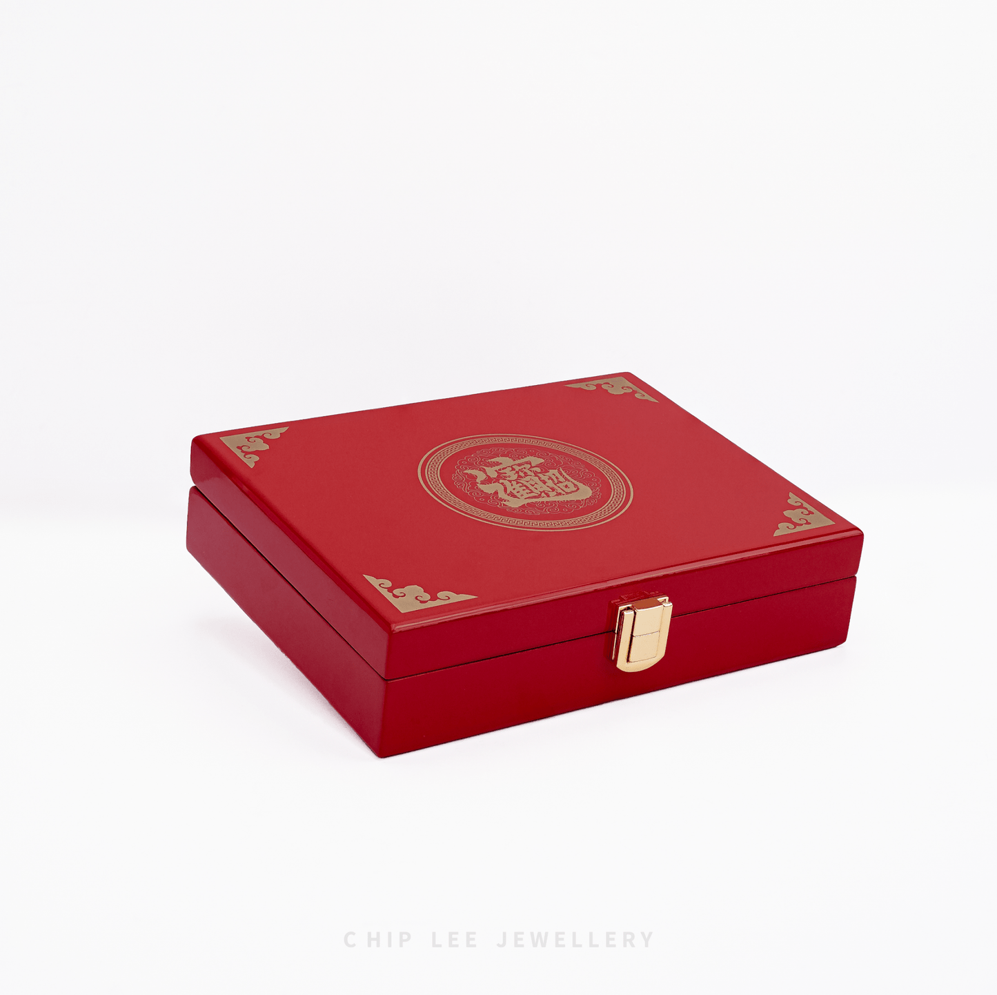 Gold ingot with Chinese characters on a white background