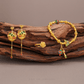 999 Pure Gold Prosperous Peaks Gu Fa Jin Earrings featuring traditional Chinese designs and and ancient craftsmanship.
