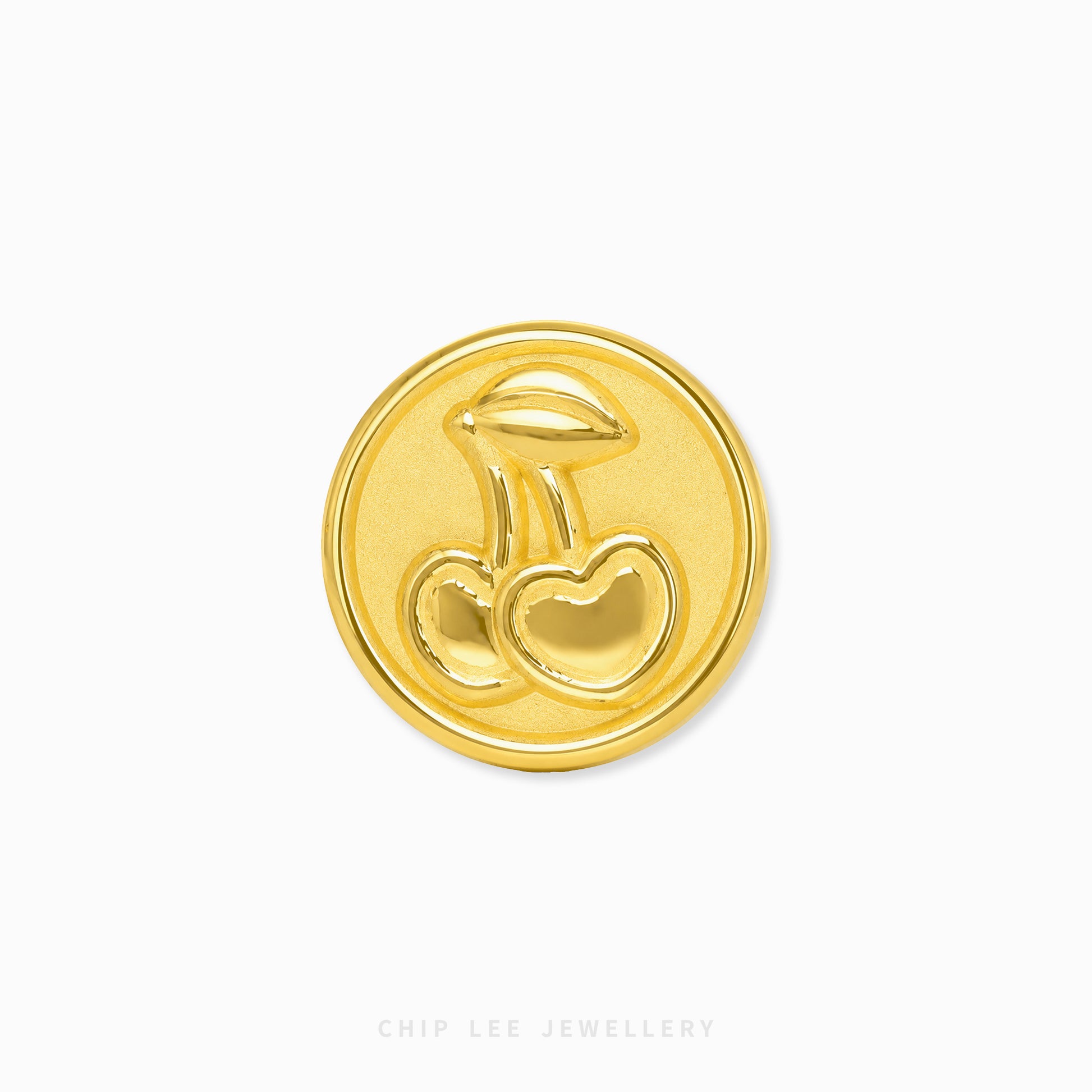 A round gold charm featuring a raised design of two cherries on a white background, with the brand name 'CHIP LEE JEWELLERY' printed at the bottom.