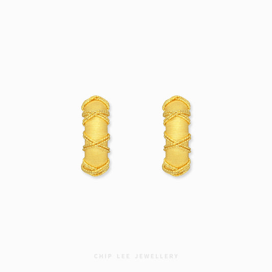 A pair of gold hoop earrings with a textured, wrapped design, displayed on a clean white background with the brand name 'CHIP LEE JEWELLERY' printed at the bottom.