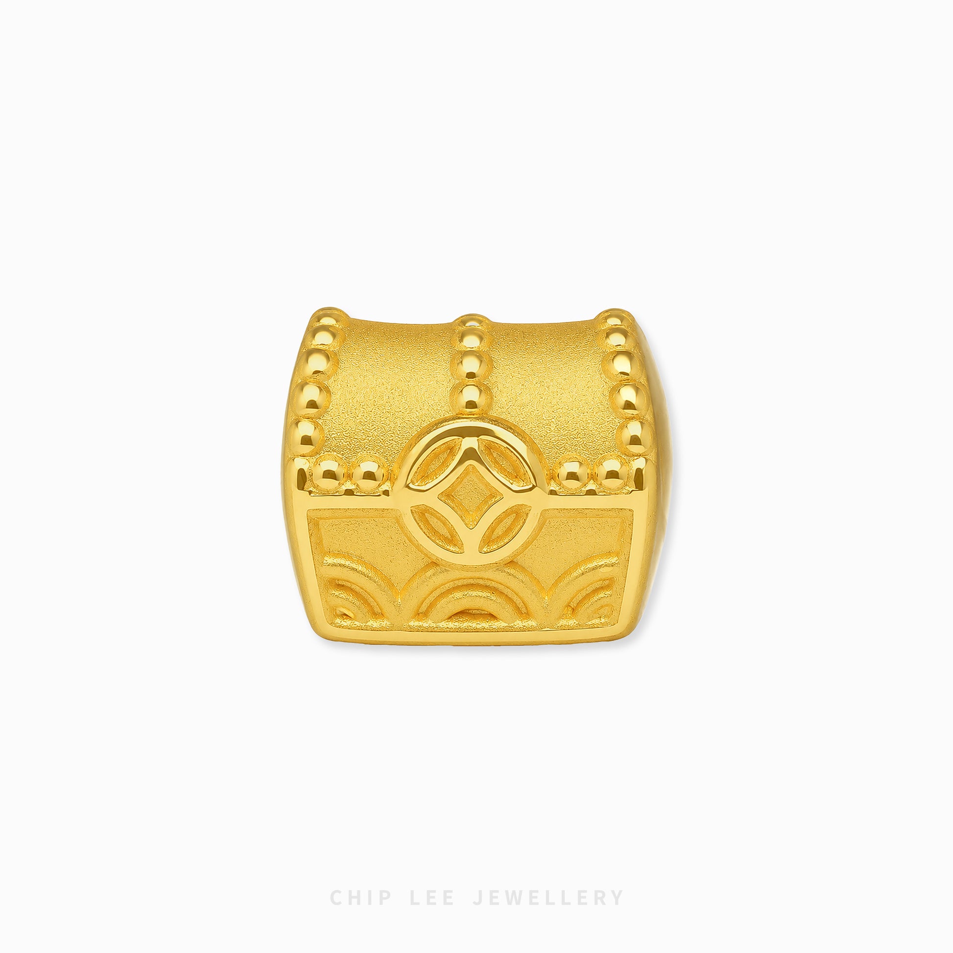 A gold treasure chest charm with embossed details and a central diamond motif, shown on a clean white background with the brand name 'CHIP LEE JEWELLERY' at the bottom.