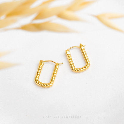 999 Pure Gold Twist Hoop Earring with elegant spiral twist design, crafted from solid 24K gold by Chip Lee Jewellery Singapore 