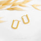 999 Pure Gold Twist Hoop Earring with elegant spiral twist design, crafted from solid 24K gold by Chip Lee Jewellery Singapore 