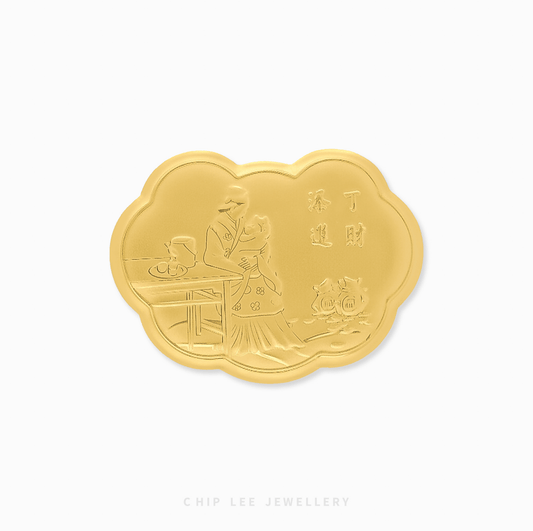 Gold ornament with intricate design on a white background, featuring 'Chip Lee Jewellery' branding.