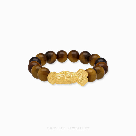 Close-up image of 999 Pure Gold Yellow Tiger Eye Pixiu Bracelet with gold links and yellow tiger eye beads on display