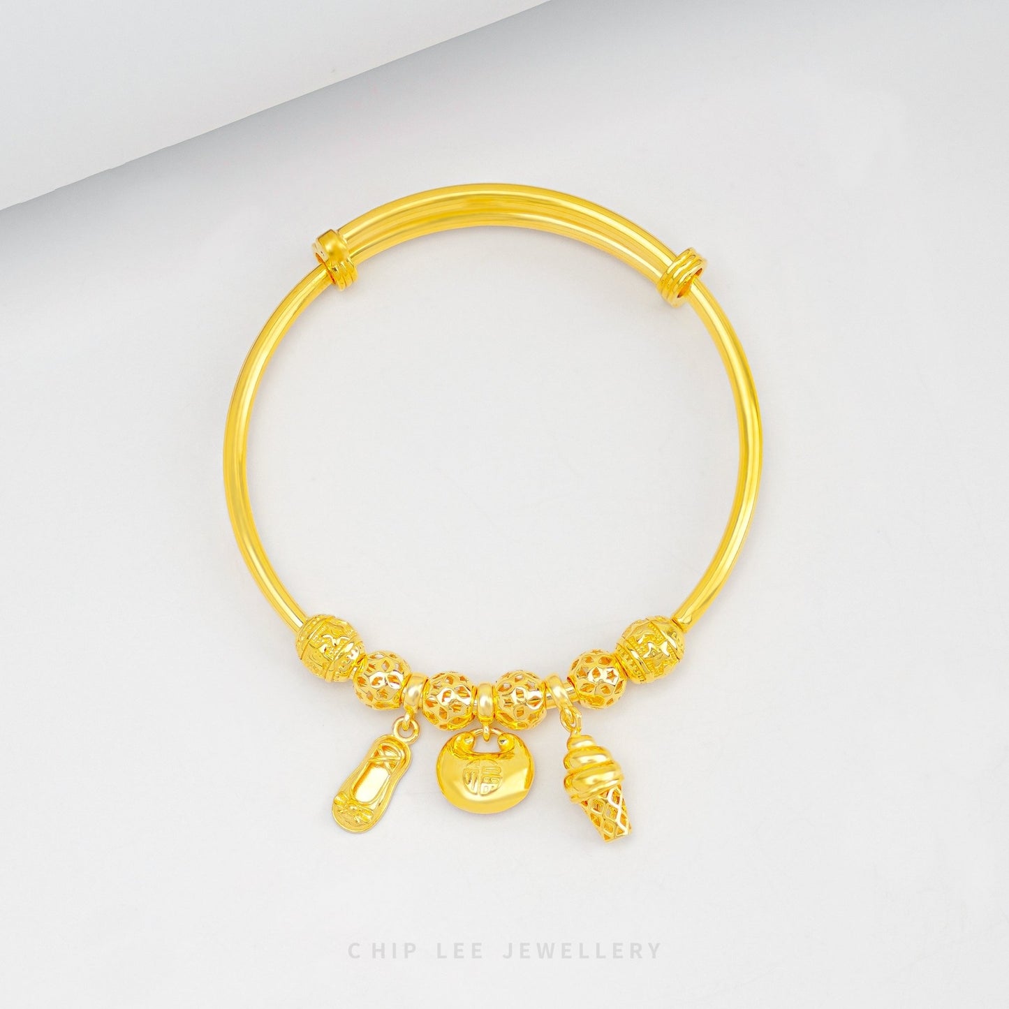 Abundance & Prosperity Baby Bangle in 916 gold symbolizing growth, luck, and elegance for newborns and toddlers.